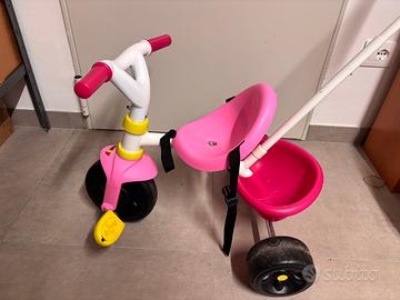 Triciclo Smoby rosa con maniglione