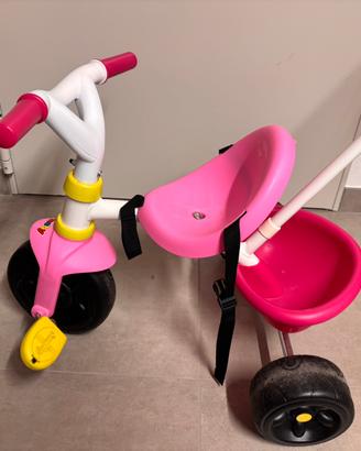 Triciclo Smoby rosa con maniglione