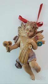 ANGIOLETTO CON FIORI E SPIGHE DI GRANO