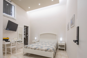 Camera con bagno privato e minifrigo