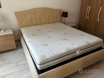 Letto matrimoniale contenitore con doghe in legno