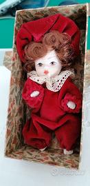 Bambola in ceramica da collezione