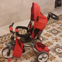 Triciclo con maniglione colore rosso pieghevole