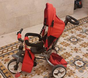Triciclo con maniglione colore rosso pieghevole