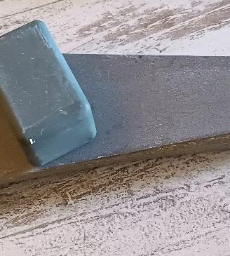 Pietra levigatrice triangolare con boot