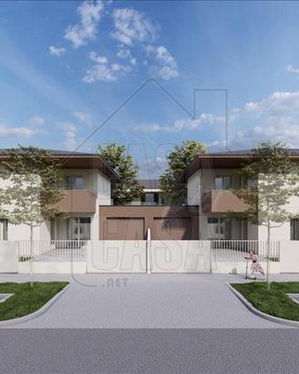 Nuova realizzazione di bifamiliare con giardino ad