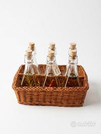 Set 6 bottiglie da 60 ml.  con cestino vimini