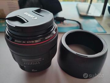 obiettivo canon, microfono rode e flash canon