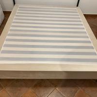 Sommier con doghe in legno e rivestimento in beige