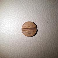 Gettone telefonico 7702