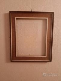 Cornice in legno e stoffa