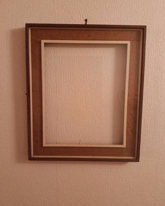 Cornice in legno e stoffa