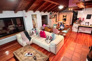 Stupendo loft mansardato con giardino esclusivo