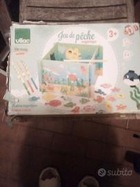 gioco con pesciolini di legno e lenza magnetica