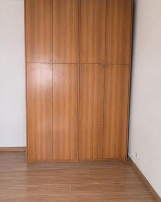 Armadio quattro ante in legno-capiente