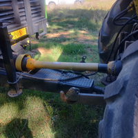 New Holland TL 100 e rimorchio