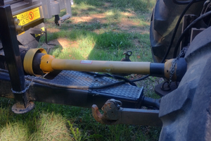 New Holland TL 100 e rimorchio