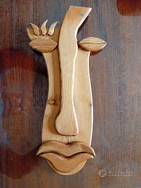 volto astratto in legno 