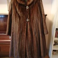 Tre pellicce di visone, marmotta, volpe argentata.