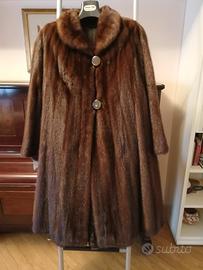 Tre pellicce di visone, marmotta, volpe argentata.