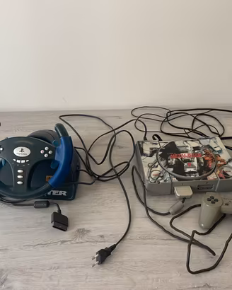 Play Station 1  e volante