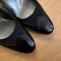 Scarpe nere con tacchetto