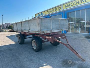 rimorchio marca Barbieri .trilaterale a due assi