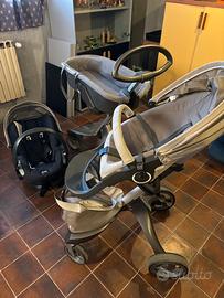 Trio Stokke Xplory e altro passeggino Stokke