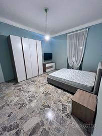 Camere arredate grandi