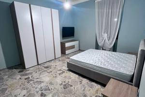 Camere arredate grandi