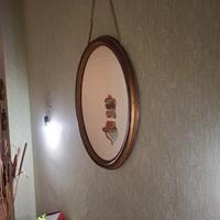 Specchiera ovale da muro patina dorata 
