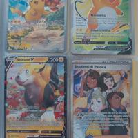 Tre libretti di carte pokemon