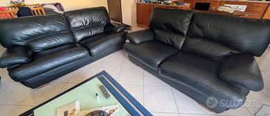 coppia divani in pelle 3+2 con letto matrimoniale 
