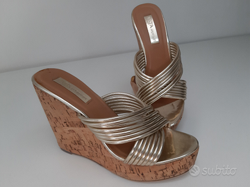 Scarpe oro shop con zeppa