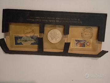 Moneta d'argento e fracobolli