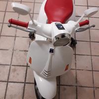 scooter elettrico giocattolo con musica MP3