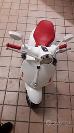 scooter elettrico giocattolo con musica MP3