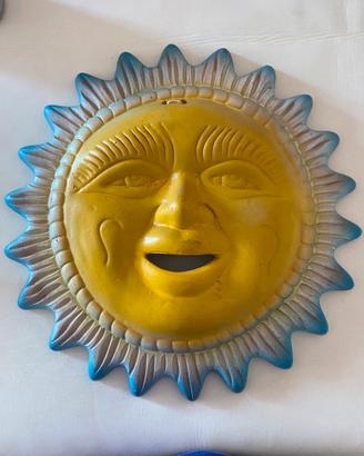 Decorazione da parete a forma disole.