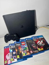 PlayStation4 Slim usata con giochi e controller