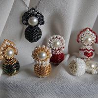 Collana con bambolina