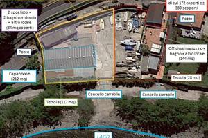 Sul lago terreno con capannone