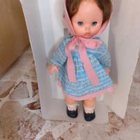 Bambola e passeggino