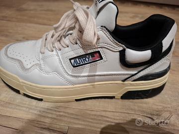 SNEAKERS CLC LOW IN PELLE BIANCA E SUEDE NERA

