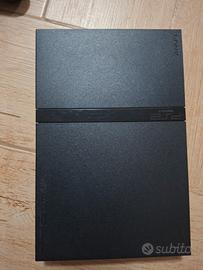 PlayStation 2 con joystick e memoria card