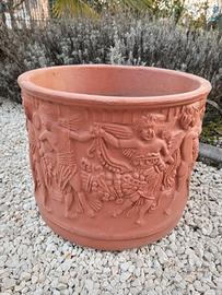 portavano con putti in rilievo 