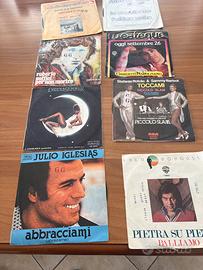 8 dischi in vinile 45 giri