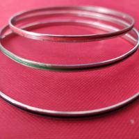 3 bracciali in argento rigidi