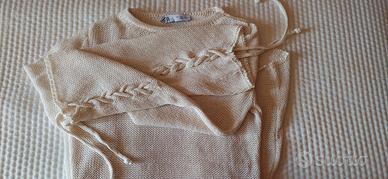 Vestitino traforato con sottoveste. 