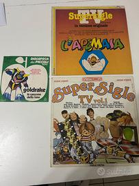 Lotto dischi vinili cartoni animati Leggi bene !