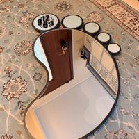 specchio da parete design con orologio forma piede